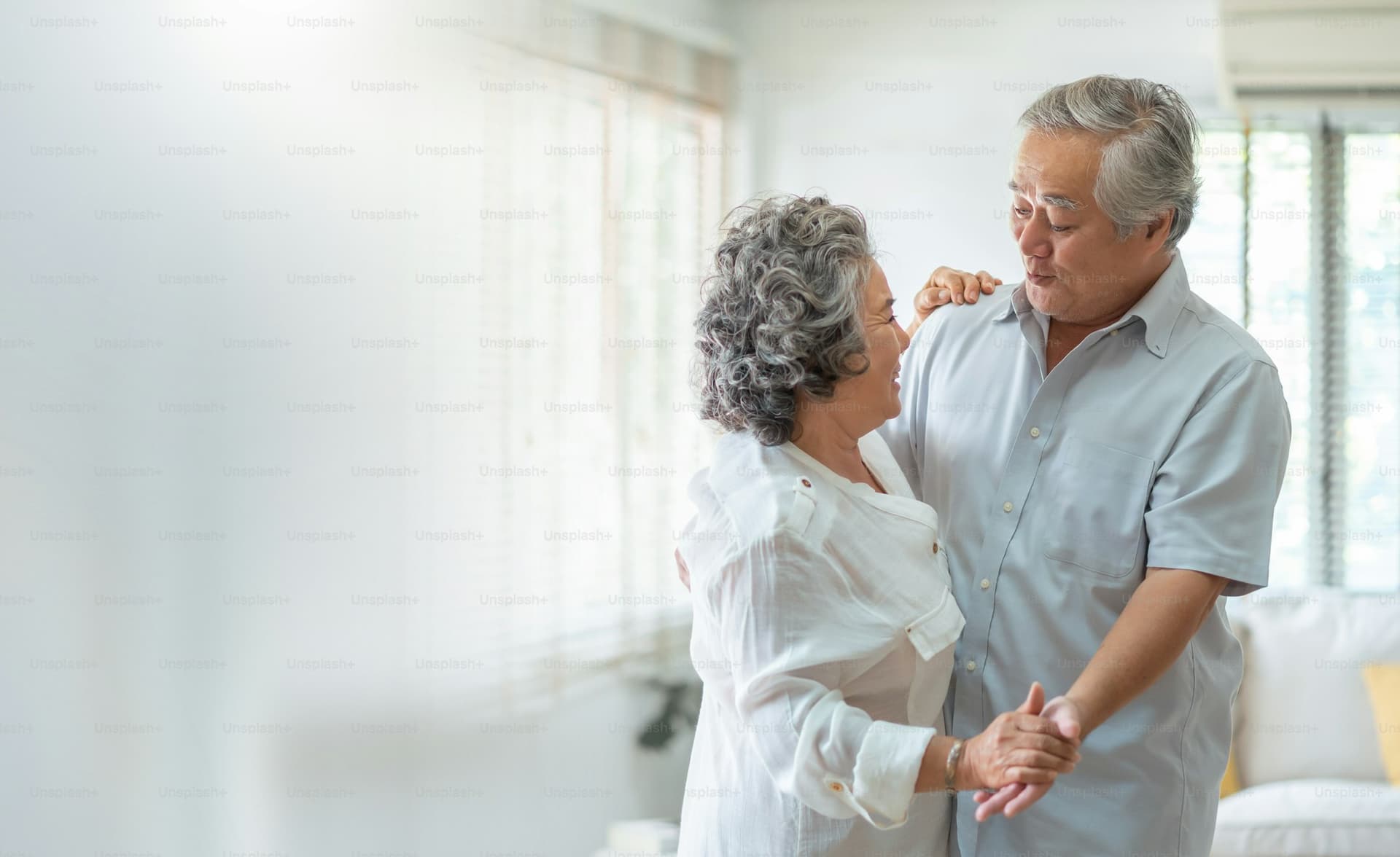 In-home caregiver supporting an older adult
